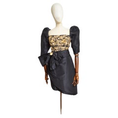 Nina Ricci Haute Couture Vestido de cóctel negro y dorado con mangas abullonadas y brocado