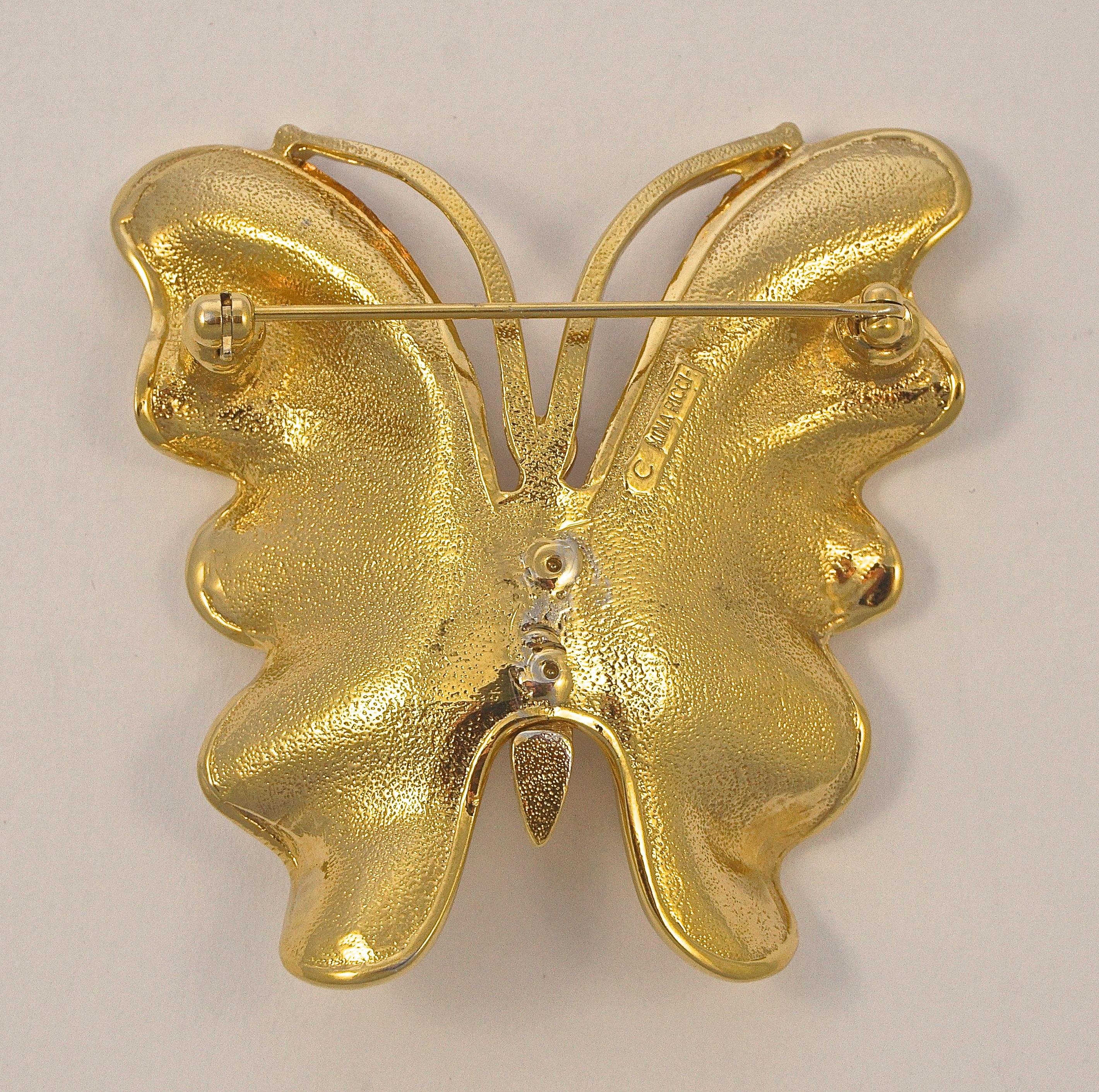 Fabulous Nina Ricci large gold plated shiny butterfly brooch, the back is textured. Measuring length 5.3cm / 2.08 inches by width 5.2cm / 2.05 inches. There is some scratching to the gold plate. Circa 1980s.

This beautiful and quality designer