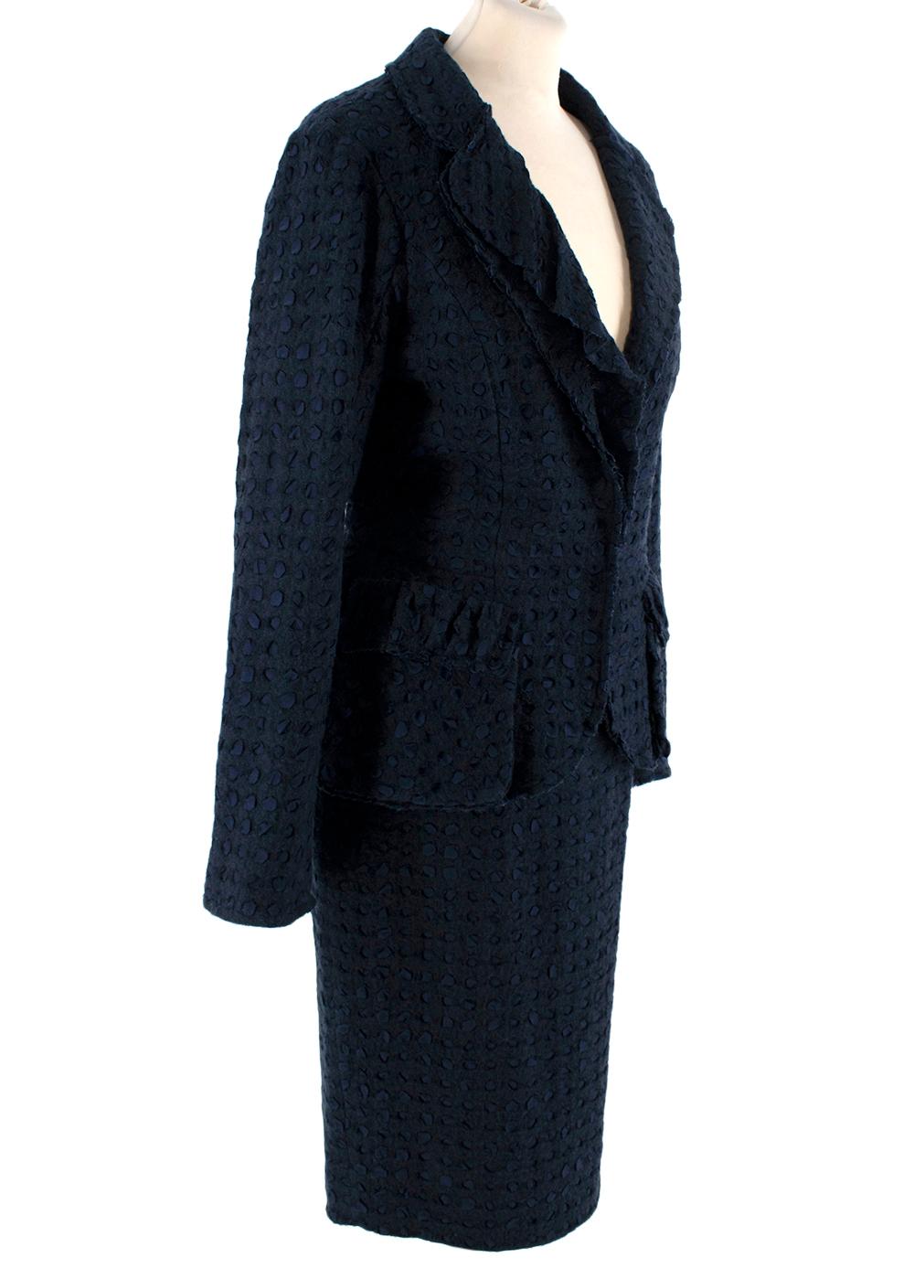 Nina Ricci Navy Blue Textured Boucle Wool & Ribbon Skirt Suit Set

- Elegant textural skirt suit, crafted from an unusual navy blue boucle wool and fabric fusion, creating a tone-on-tone polka-dot effect 
- Single breasted jacket, with peplum hem