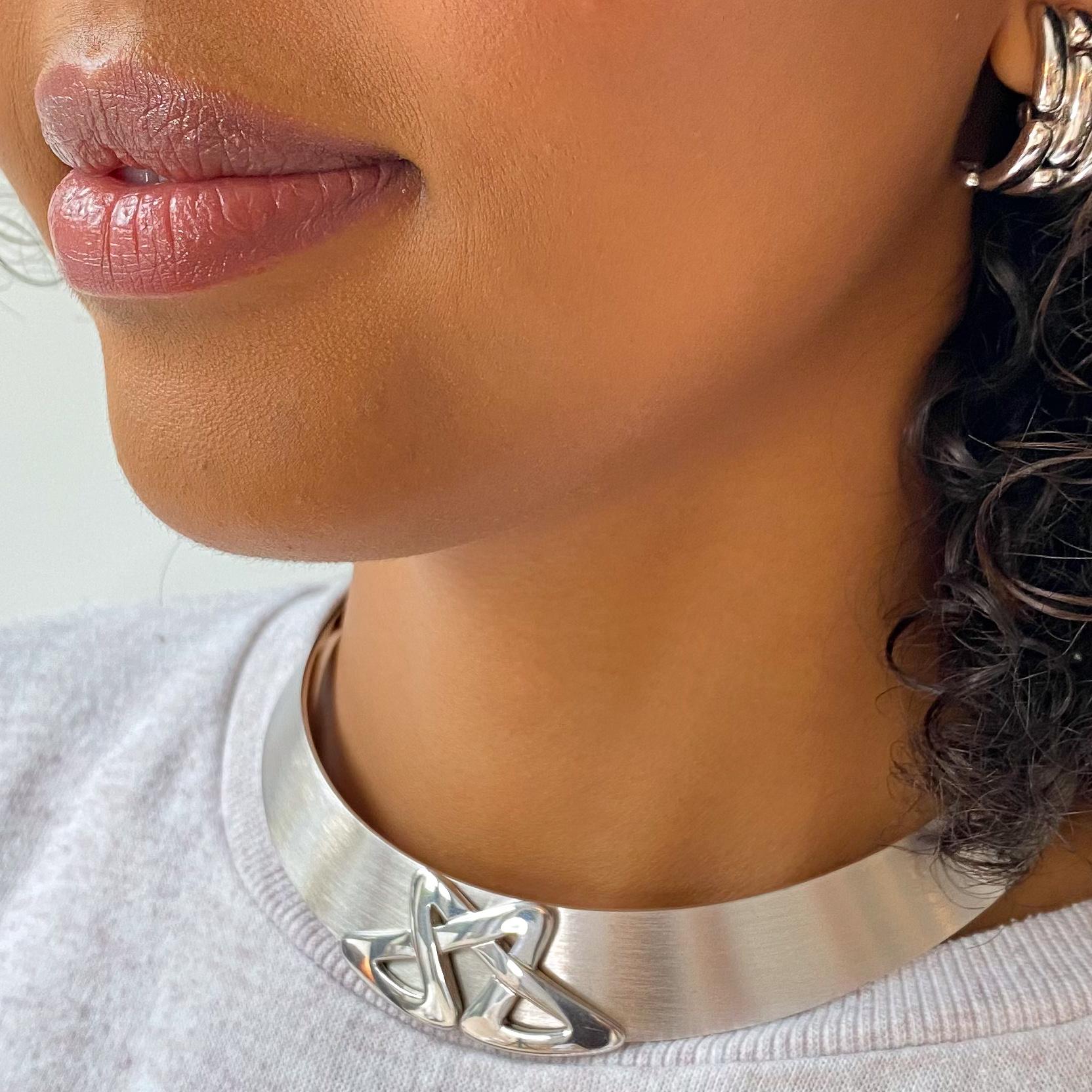 Nina Ricci Necklace Vintage Sterling Silver Choker

An incredible sterling silver collar necklace from the legendary French designer Nina Ricci. Made in the 1990s with 1970s styling with an abstract geometric take on the Nina Ricci initials