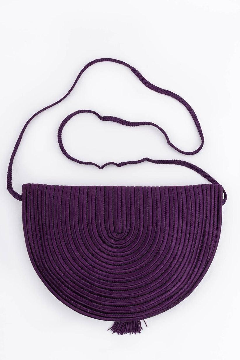 Nina Ricci (Made in France) Small passementerie bag with a tassel.

Additional information: 
Dimensions: Width: 25 cm (9.84 in), Height: 17.5 cm (6.9 in), Handle length: 107 cm (42.12 in) 
Condition: Very good condition
Seller Ref number: S108
