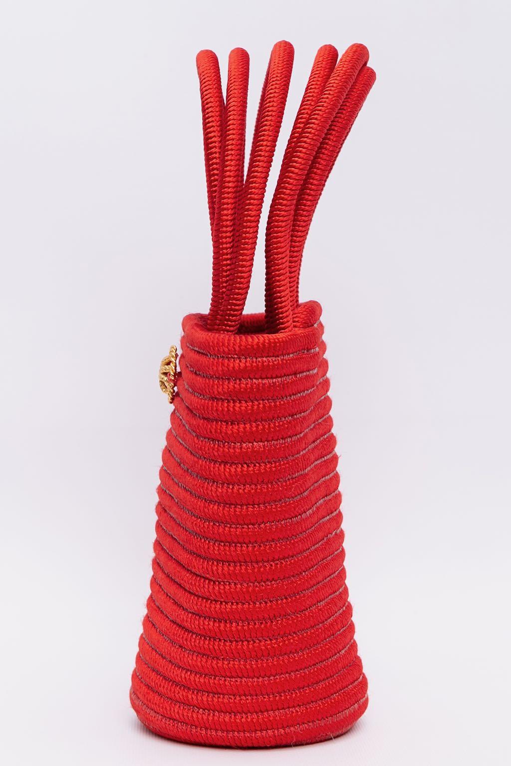 Nina Ricci (Made in France) Red passementerie bag.

Additional information: 

Dimensions: 
Length: 20 cm (7.87
