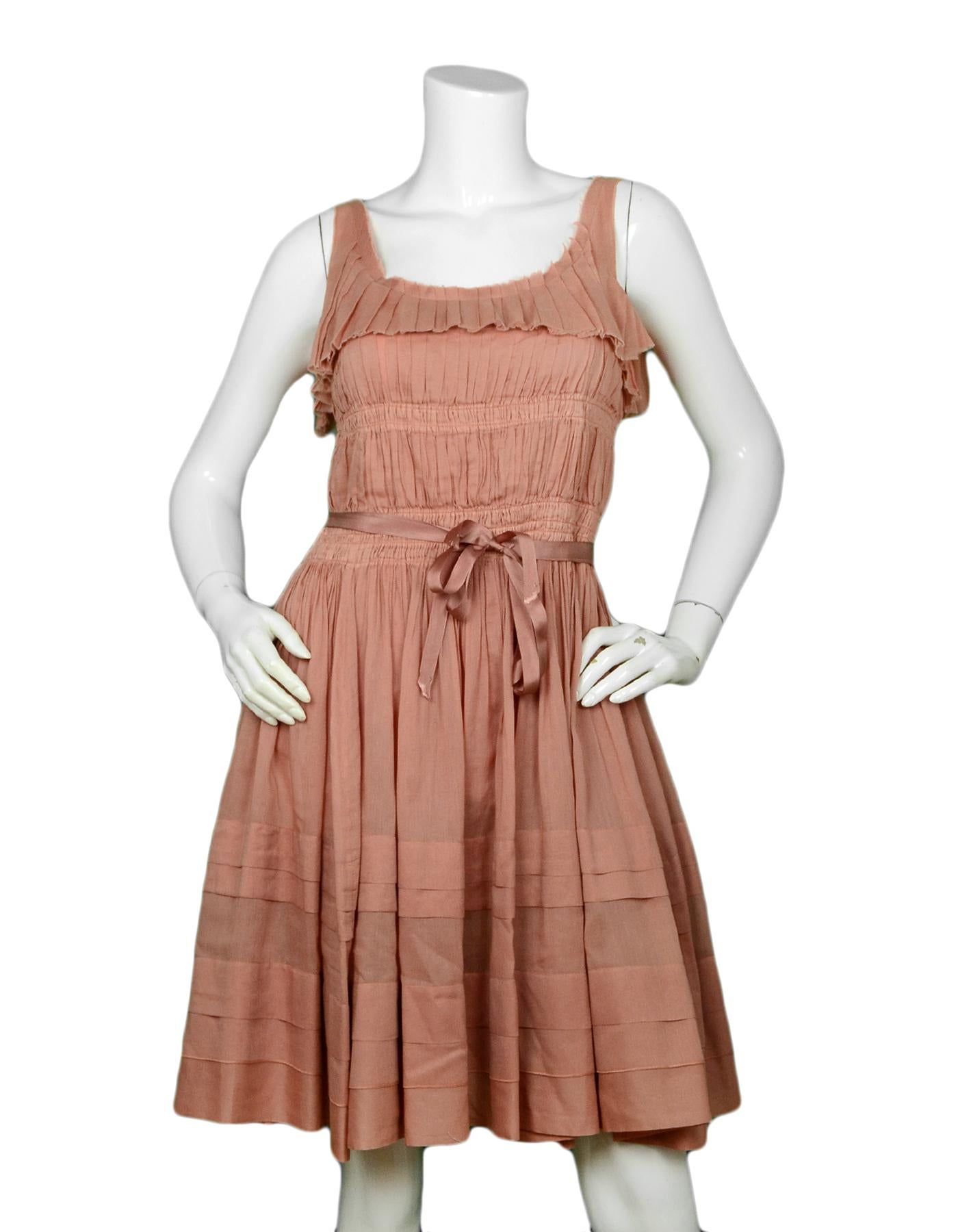 Nina Ricci Peach Sleeveless Dress with Pleating sz IT 38

Made In: Romania
Color: Peach
Materials: 100% cotton
Lining: 100% cotton
Opening/Closure: Back zip
Overall Condition: Excellent pre-owned condition, faded tag

Tag Size: IT 38, US 2 *Please