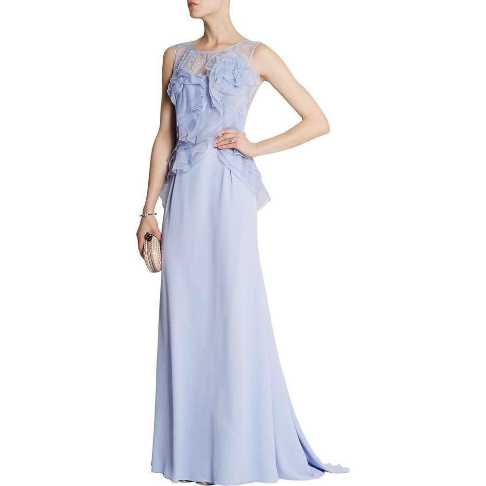 Nina Ricci's lavender silk crêpe sleeveless gown is flou tailored with layers of frothy ruffles running in a diagonal across the bodice.
The floor-length gown is styled with a lavender lace back and lavender lace gathered front neckline.
Jewel