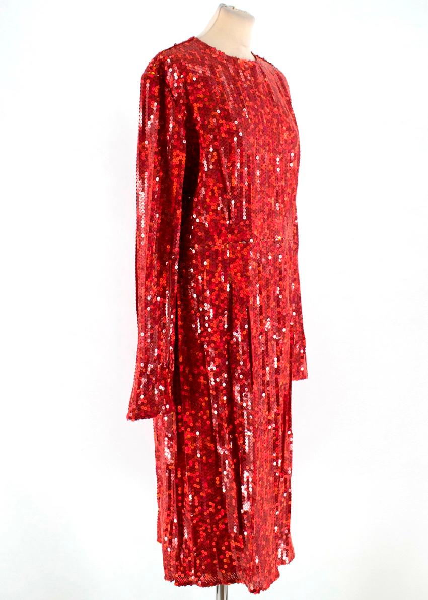 Nina Ricci Sequin Embellished Georgette Dress

- round neck - long sleeve - knee length - back zip - lining - zip on the sleeve

Please note, these items are pre-owned and may show signs of being stored even when unworn and unused. This is reflected