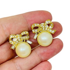 NINA RICCI signed vintage gold tone pearl rhinestone bow designer clip earrings