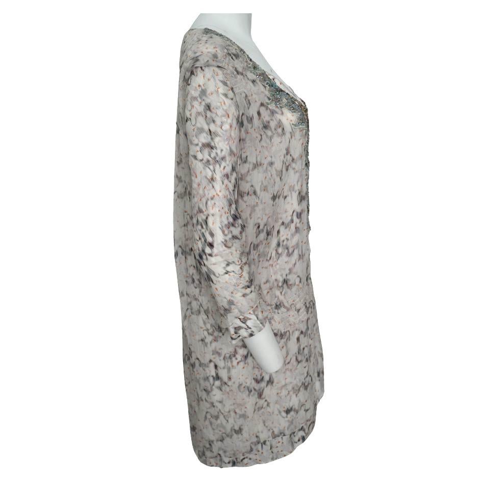 Casacca in seta multicolore di Nina Ricci
Taglia 38 
Lunghezza 37