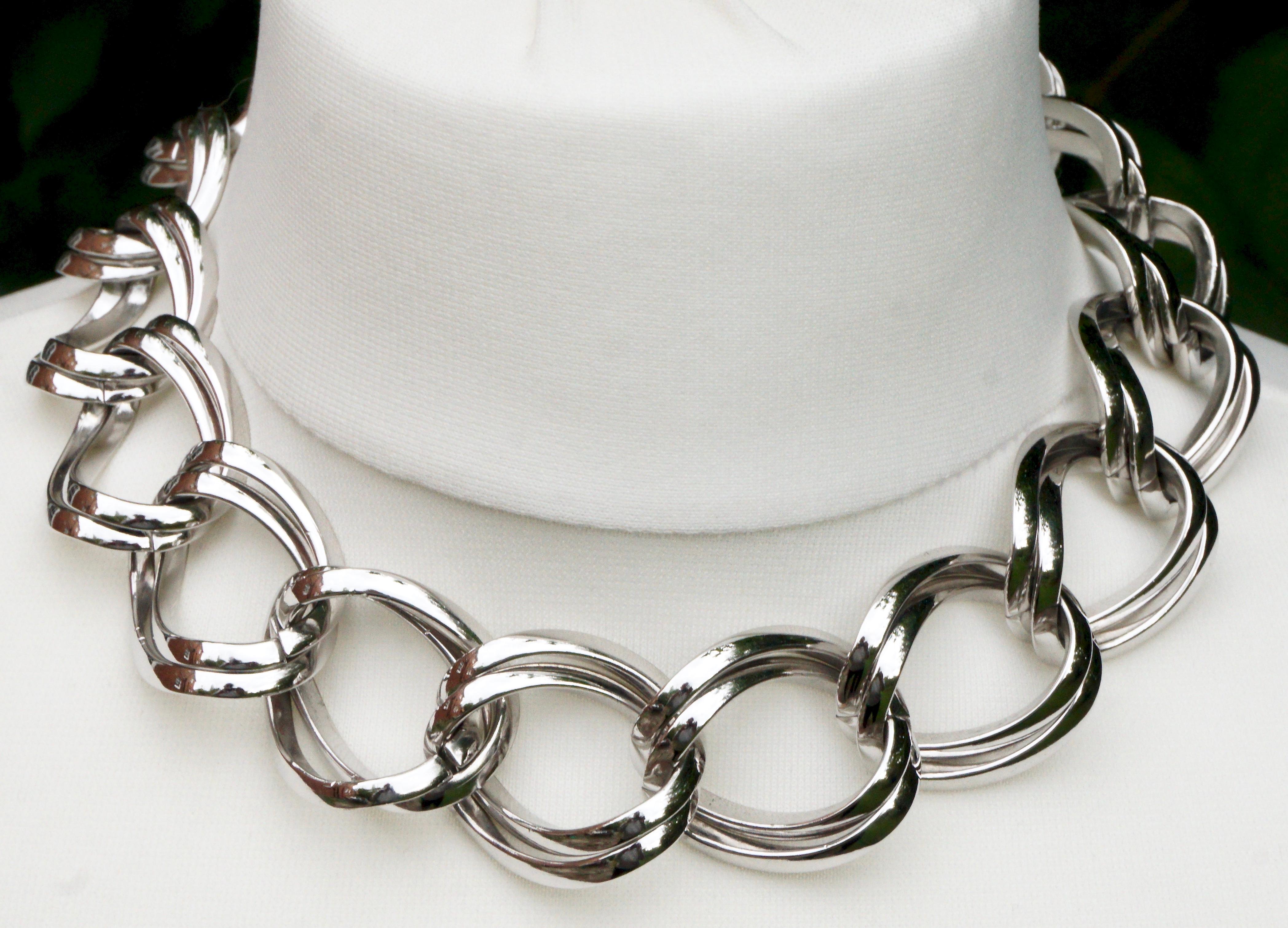 Nina Ricci silver plated double chain link collar / necklace. Length 43.5cm / 17.1 inches by width 2.8cm / 1.1 inch. The necklace is in very good condition. Circa 1980s.

This is a stylish vintage necklace in a classic smart and simple design that