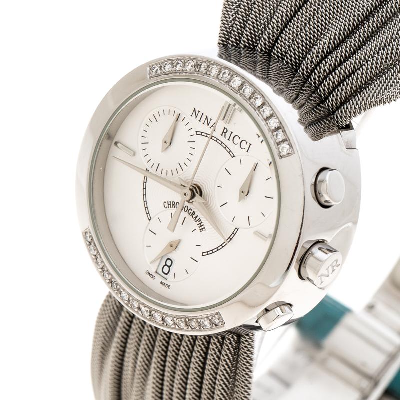 At first glance, one would think this piece is a bracelet, but it is actually a wristwatch. It is such a versatile creation. In a round stainless steel case, a silver-white dial sits with three subdials for the chronograph and the label, while