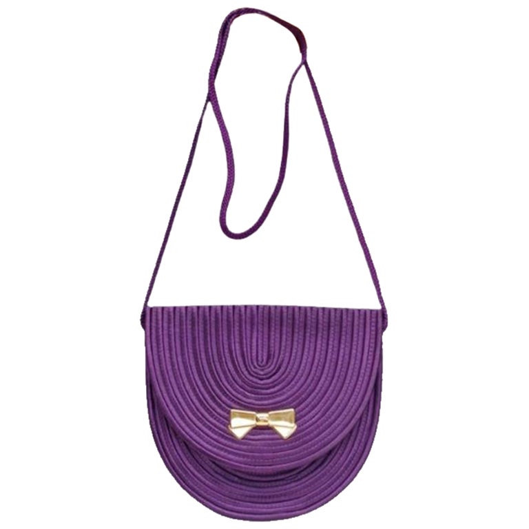 Nina Ricci Kleine Clutch in lila Passementerie