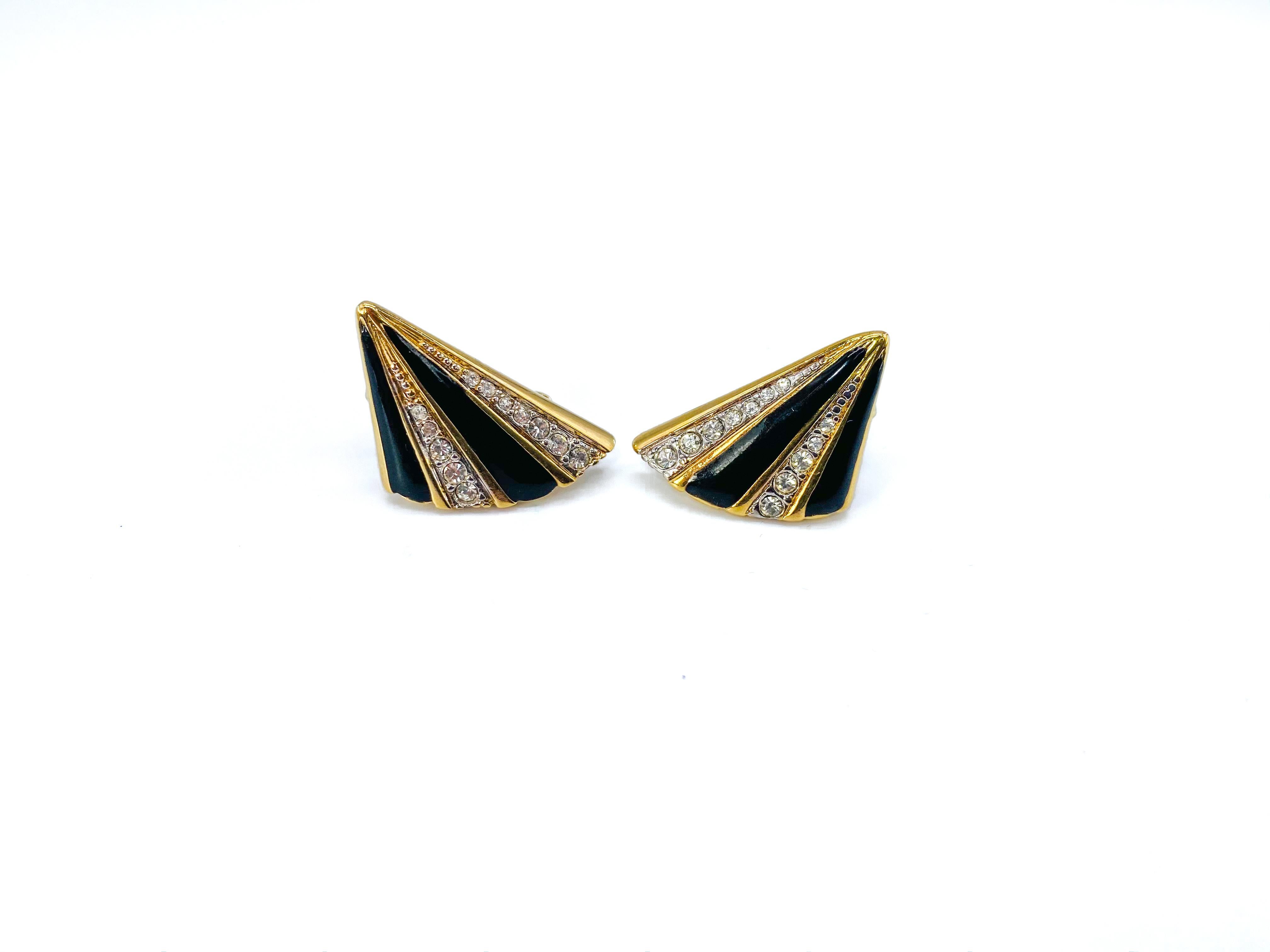 Nina Ricci Vintage 1980s Earrings for Pierced Ears

Fantastic statement 80s earrings from the House of Nina Ricci.

Detail
-Art Deco styling
-Cast from high quality gold plated metal
-Black enamel and crystal stripes

Style & Fit
-Approx 2cm / 3/4