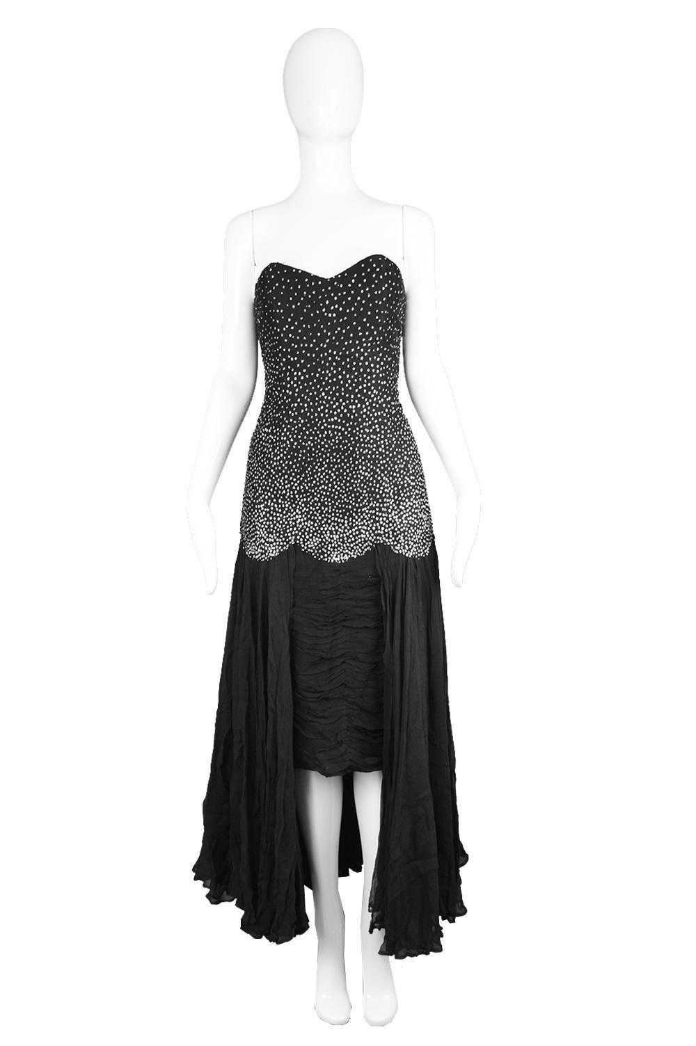 Nina Ricci Vintage Black Silk Chiffon & Silver Glitter Strapless Dress, 1980s

A breathtaking vintage women's evening gown from c. the late 80s by luxury French fashion house, Nina Ricci Paris. In a Black lace / tulle with a silver glitter effect