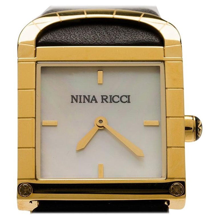 Nina Ricci Montre-bracelet classique en acier inoxydable plaqué or blanc  pour femme, 29 mm En vente sur 1stDibs
