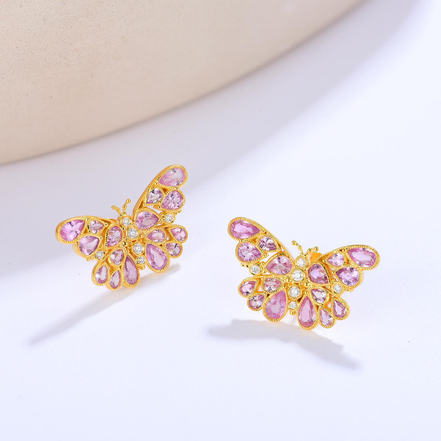 Embrace elegance and playfulness with Nina Zhou's Butterfly Pink Sapphire Diamond Earrings in yellow gold. These enchanting earrings capture the delicate beauty of butterflies, with wings adorned in soft, natural pink sapphires that shimmer in the