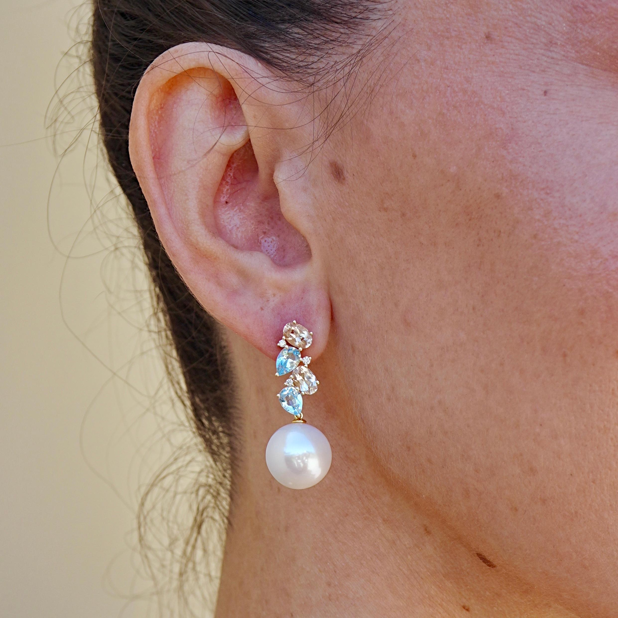 Etéreos desde todos los ángulos, estos pendientes aúnan la ternura de las gemas pastel con el brillo tranquilo de las perlas. La morganita rosa y la aguamarina azul celeste se elevan como gotas de rocío al amanecer, delicadamente salpicadas de