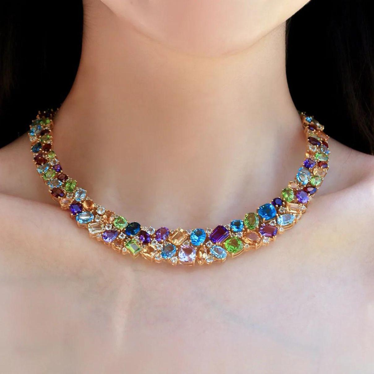 Crafted with a stunning array of carefully selected 95.00ctw natural gemstones, including aquamarine, amethyst, topaz, peridot, citrine and garnet, the necklace showcases a harmonious blend of hues that evoke the beauty of blooming flowers and lush