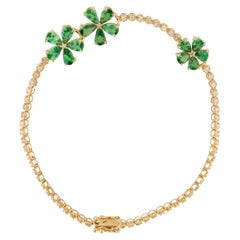 Nina Zhou Bracciale tennis con diamanti e fiori di ciliegio di Tsavorite
