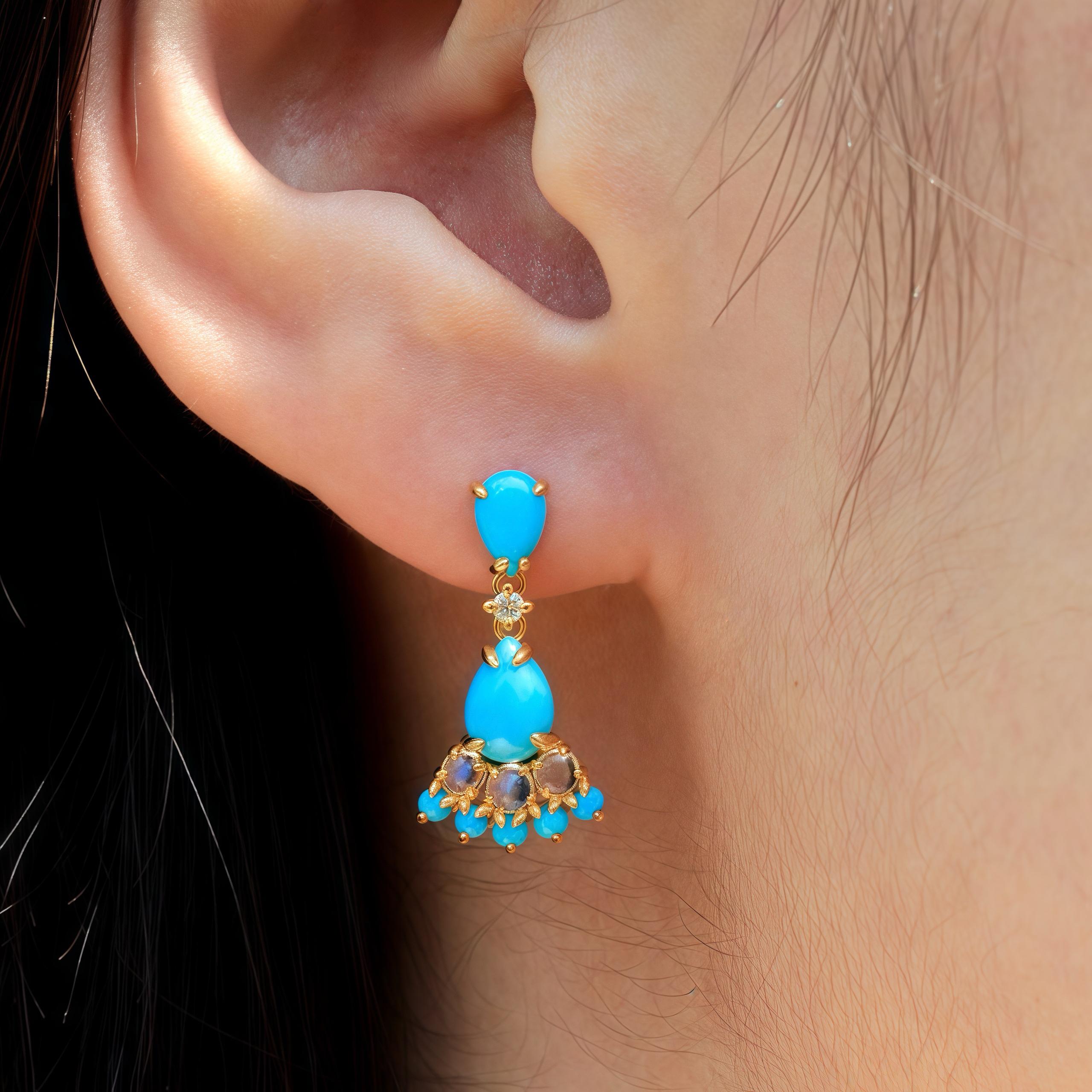 Discover Nina Zhou Turquoise Moonstone Diamond Earrings in Yellow Gold. The exquisite combination of vibrant turquoise, ethereal moonstone, and shimmering diamonds creates a mesmerizing symphony of color and light. Set in the timeless elegance of