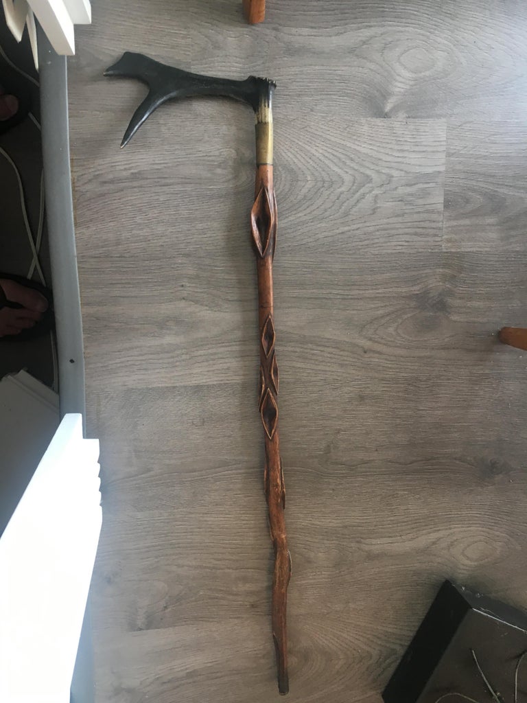 Nine AntlerMounted Canes and Walking Sticks, Some with Concealed