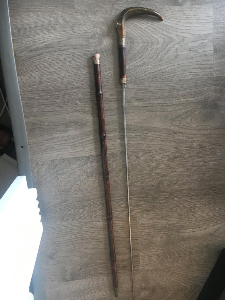 Nine AntlerMounted Canes and Walking Sticks, Some with Concealed