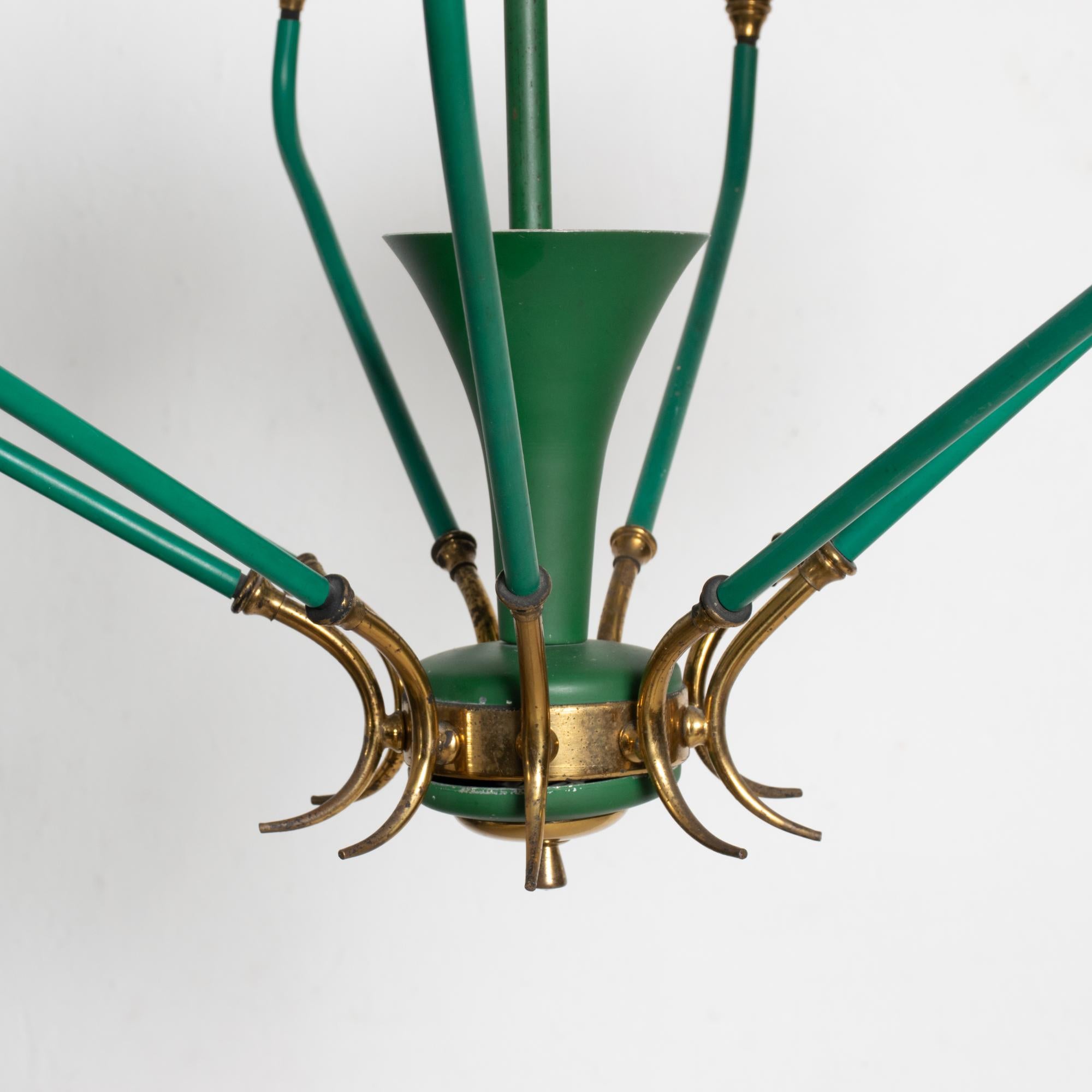 Midcentury Italy spectacular Stilnovo 1950s ninearm modern Italian chandelier in emerald green and patinated brass with opaline glass shades in a cone shape form.
Measures: 38