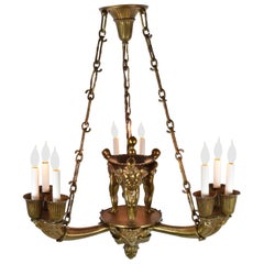 Antique Nine Candle Bronze Figural Chandelier in the Manship Style
