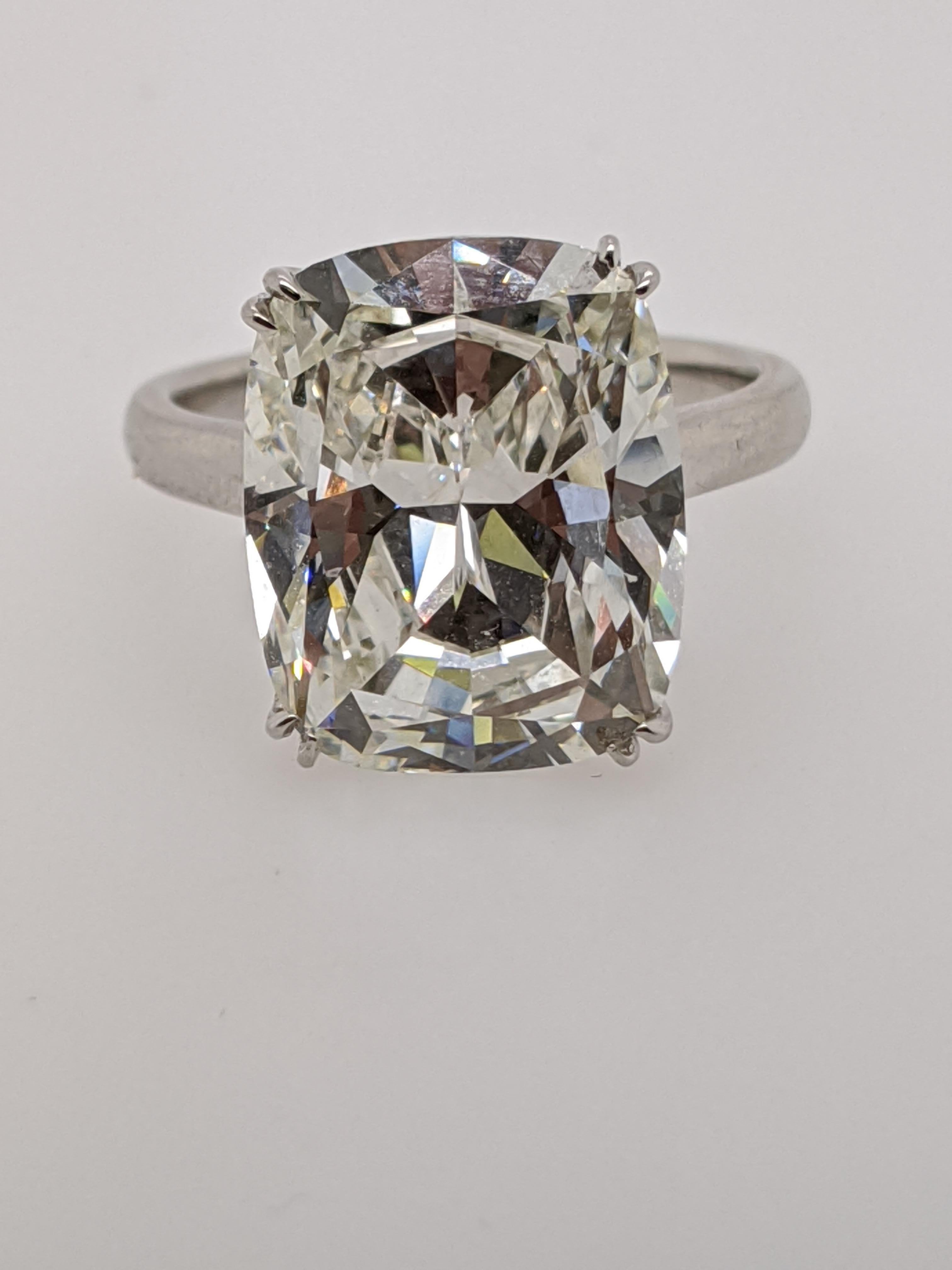 9.58 carat Classic Antique Style Cushion Cut Diamond Ring in Platinum mounting handmade in the United States.  Featuring a K color VS1 clarity antique style cushion with GIA grading report number 6204270435.

This listing has one of hundreds of