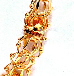 Nine Charms Link Bracelet 14kt Gold 54gm