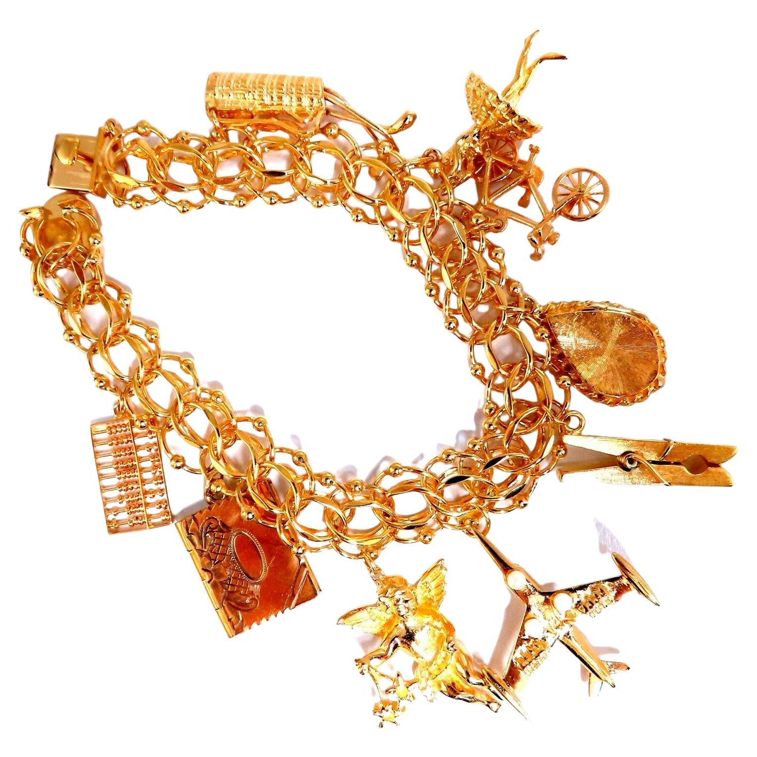 Nine Charms Link Bracelet 14kt Gold 54gm For Sale