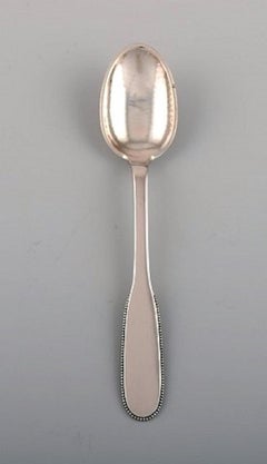 Nine Evald Nielsen Number 14 Teaspoons in Hammered Silver, 1920s