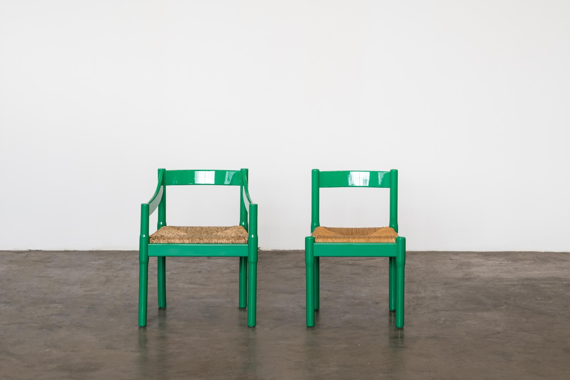 Italian Nine Green Laquered Wood Carimate Chairs by Vico Magistretti For Sale
