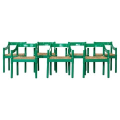 Nove sedie Carimate in Wood laccato verde di Vico Magistretti