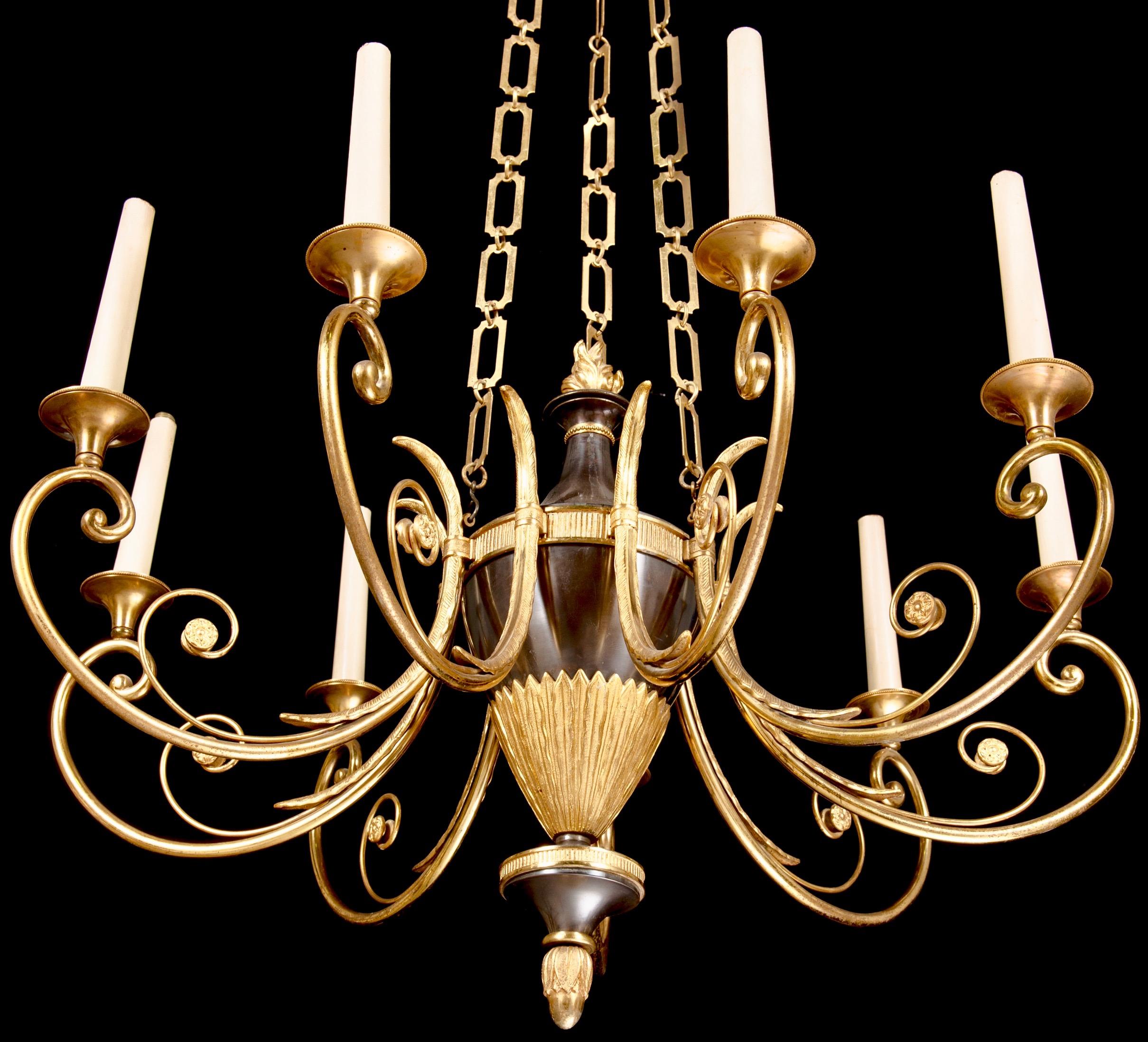 A chandelier with nine candlearms in the neoclassical style made around year 1900. Most probably Russian. Dark patinated and gilt bronze. Great design.