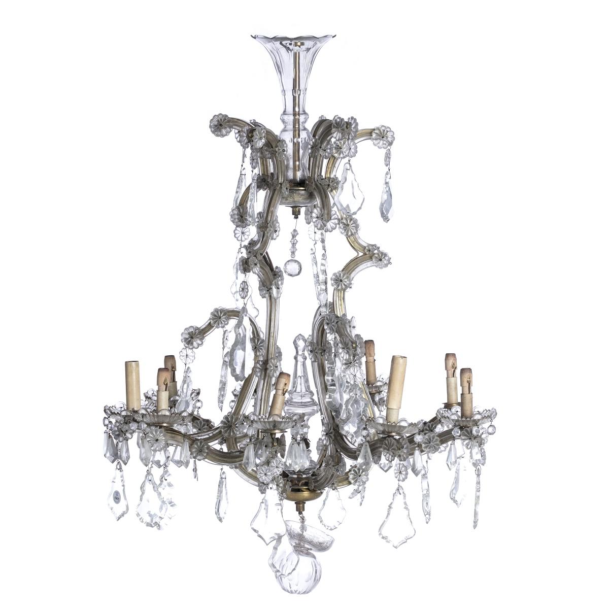 Nine light chandelier Portuguese began 20th century.
Lighting category.
in glass with bronze frame. 
Small defects. 
Height: 75 cm.
very good condition.