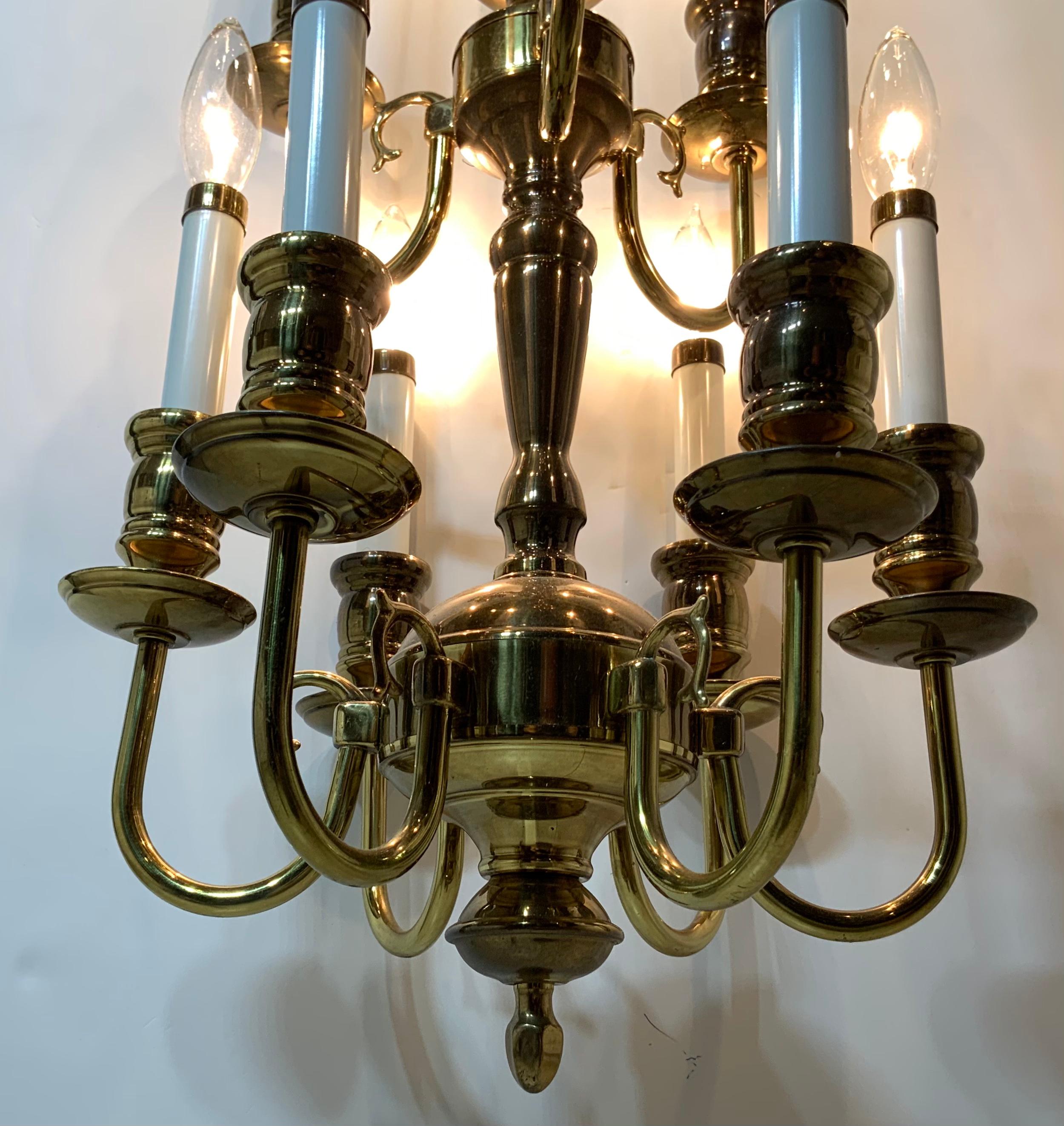 Elegant hanging chandelier made of solid brass with scrolled Ares, nine-light 60/watt each electrified and ready to use. Original canopy included.