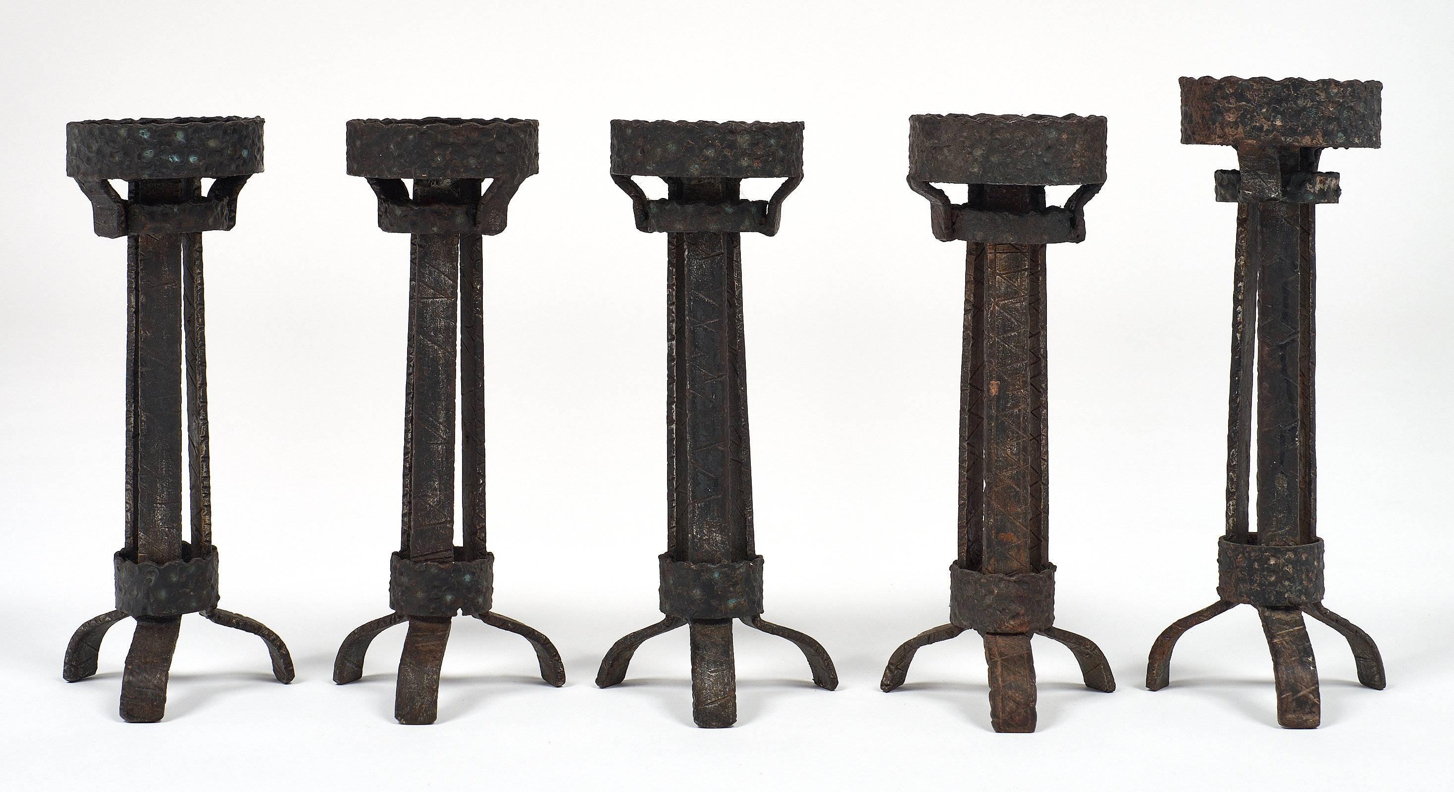 Nine Midcentury Spanish Forged Iron Candlesticks In Excellent Condition In Austin, TX