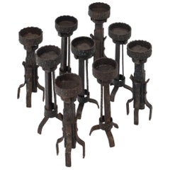 Nine Midcentury Spanish Forged Iron Candlesticks