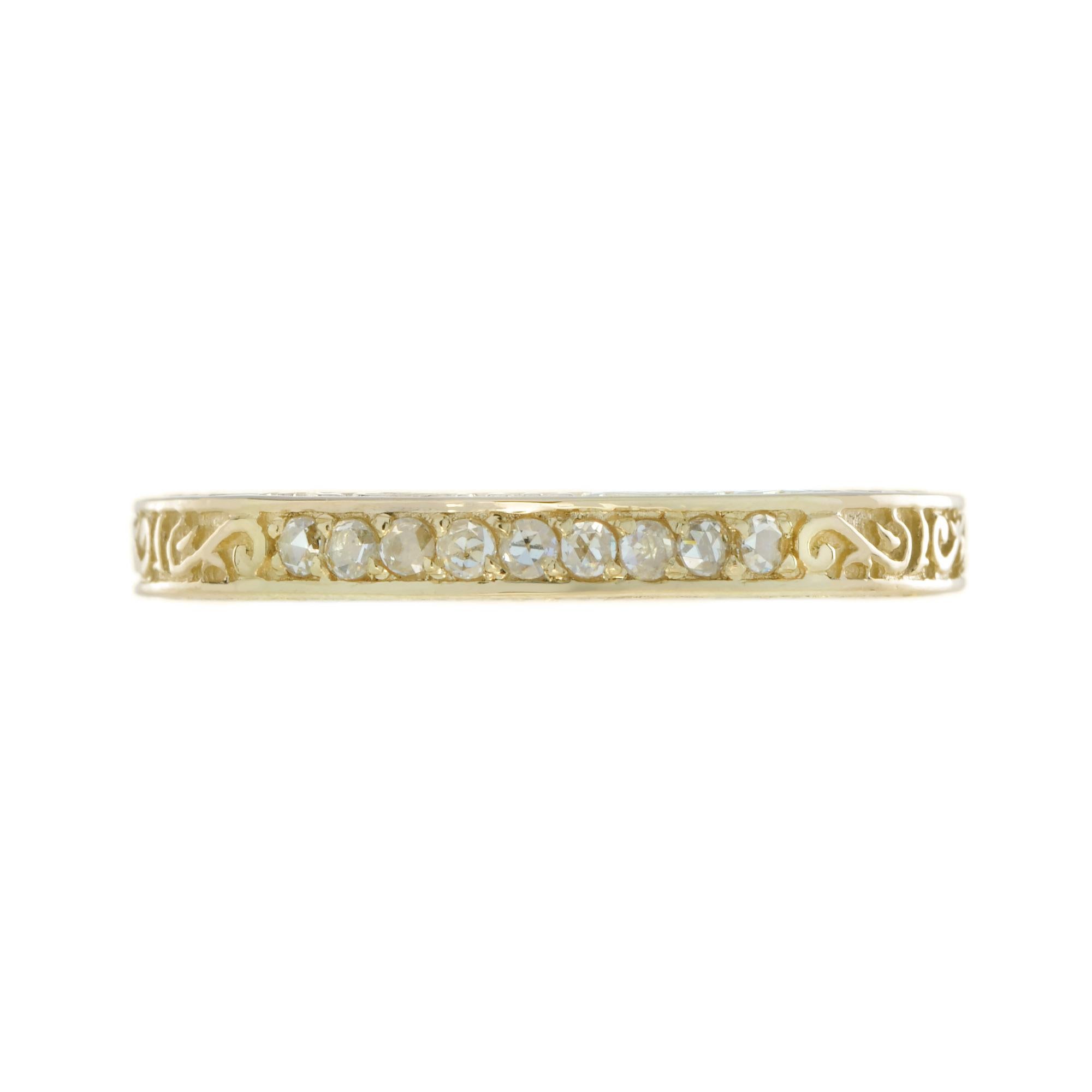 This is a lovely Victorian era design band ring in 14k yellow gold. It is set with nine rose cut diamond, estimated total weight is .14 carat H color, SI clarity overall. Beautifully made yellow gold band with engraved design.

Ring