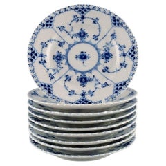 Nine Royal Copenhagen Blue Fluted Full Lace Plates in Porcelain
