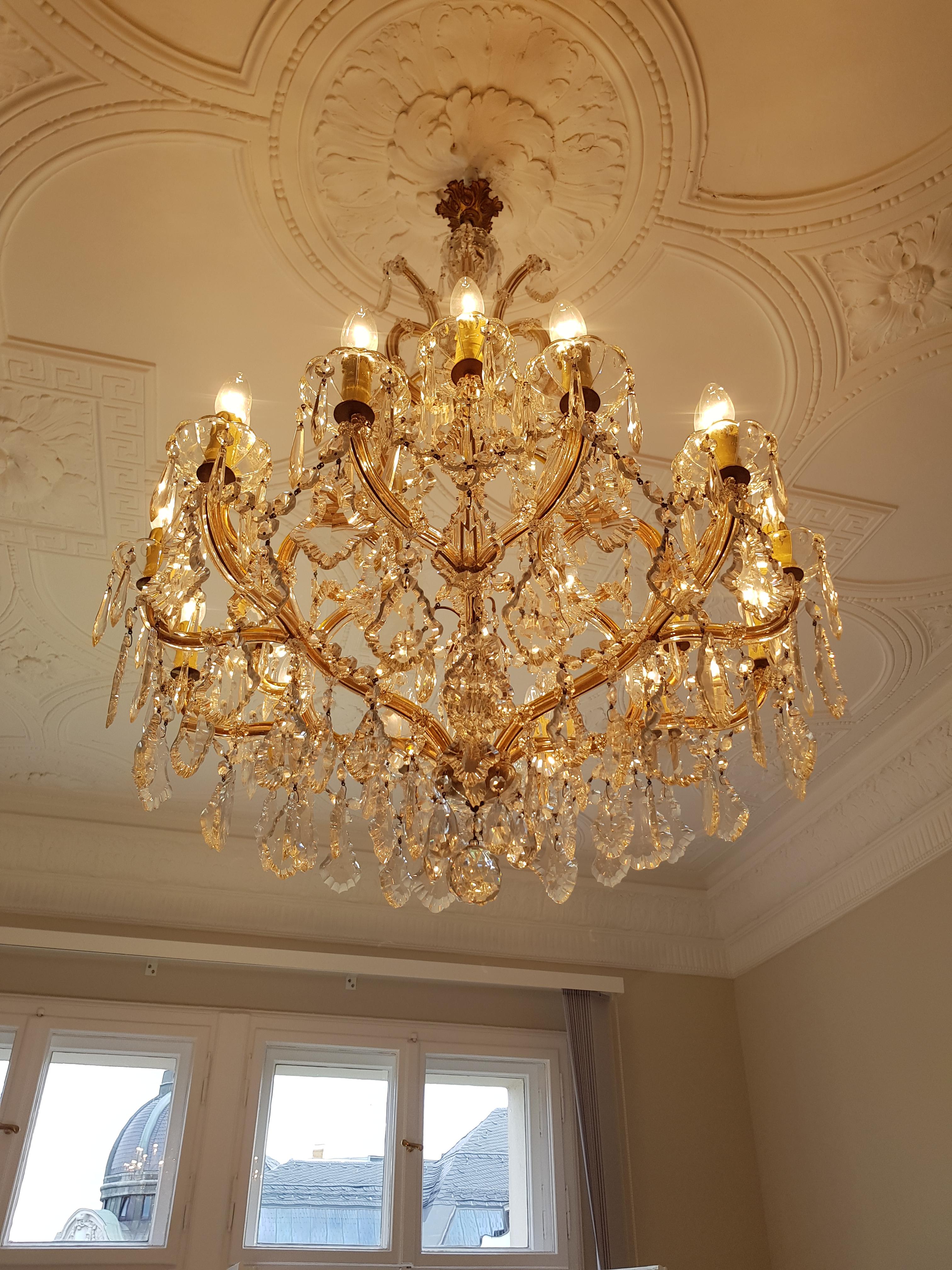 The frame is fully dressed all-over with glass. Cut crystal drops of different dimensions and shapes are hanging all-over the octagonal bottom chains, all around the chandelier.

Measures: Total height 150 cm, height without chain 100mcm, diameter