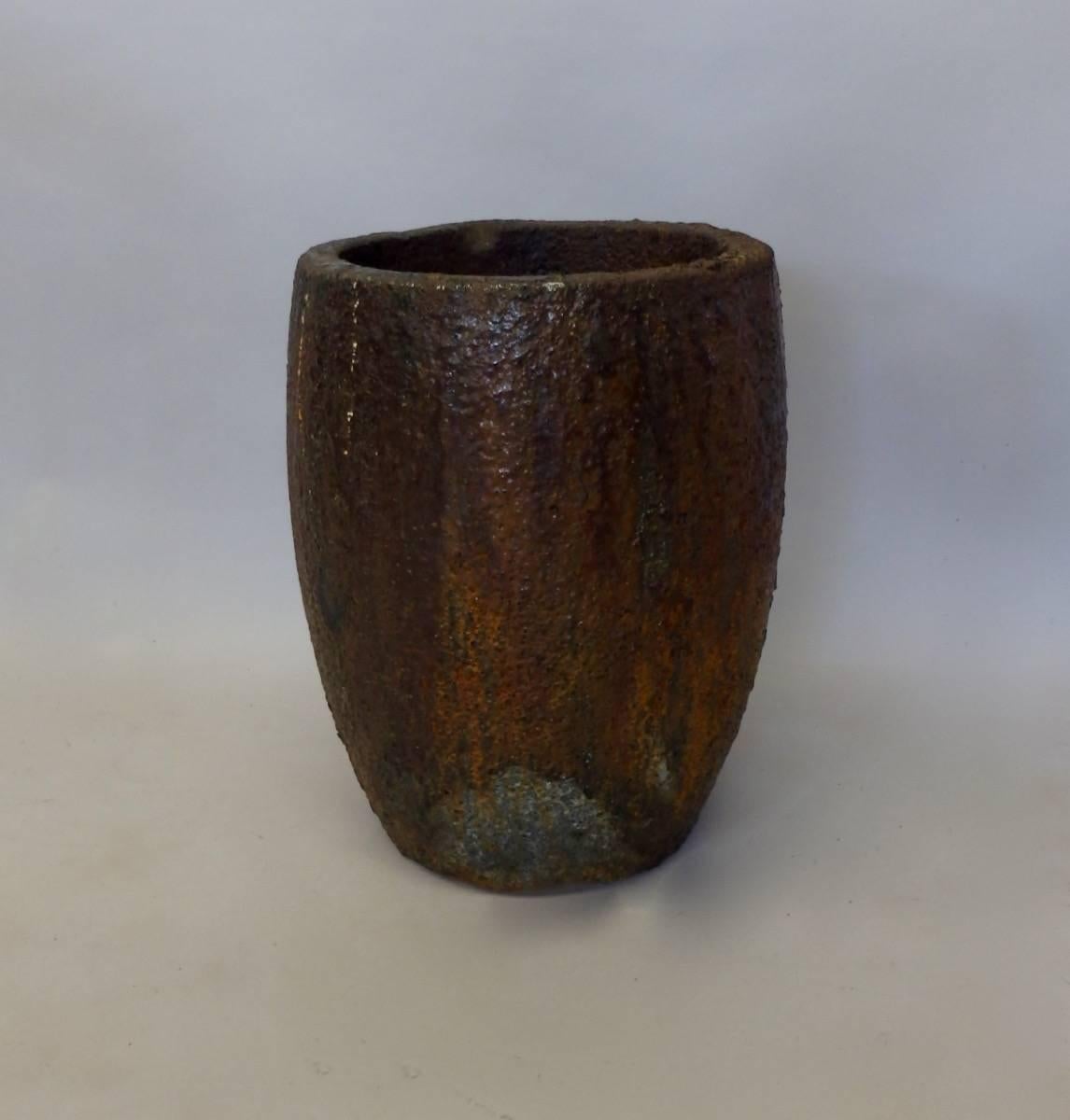 Thick and heave crucible. Brutalist floor vase or planter pot. Excellent as found patina. There is a crack in the body plenty stabile for home use but retired from its original function.