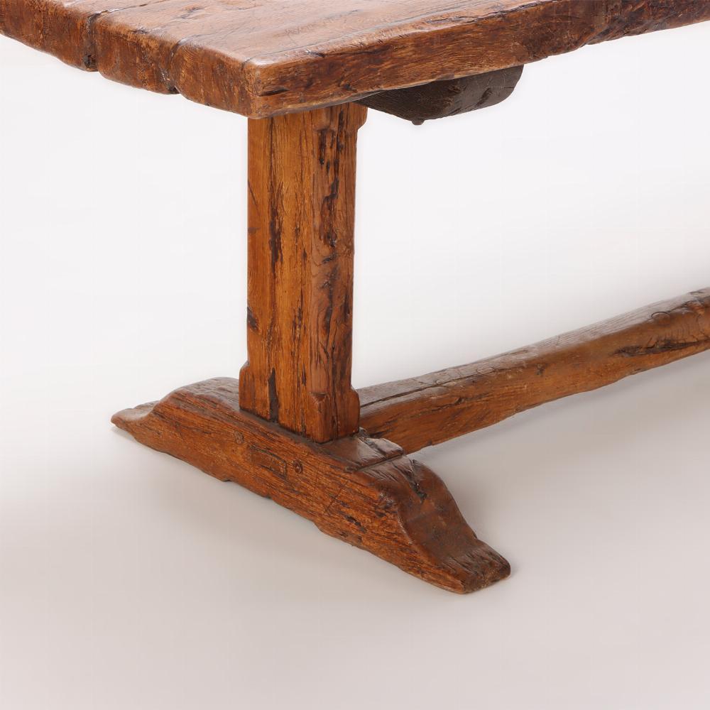 Wood Nineteenth century French Elm farm table with trestle base.
