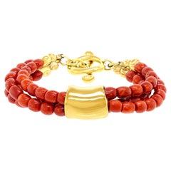 Neunziger Jahre Robert Lee Morris Gold- und Korallenarmband