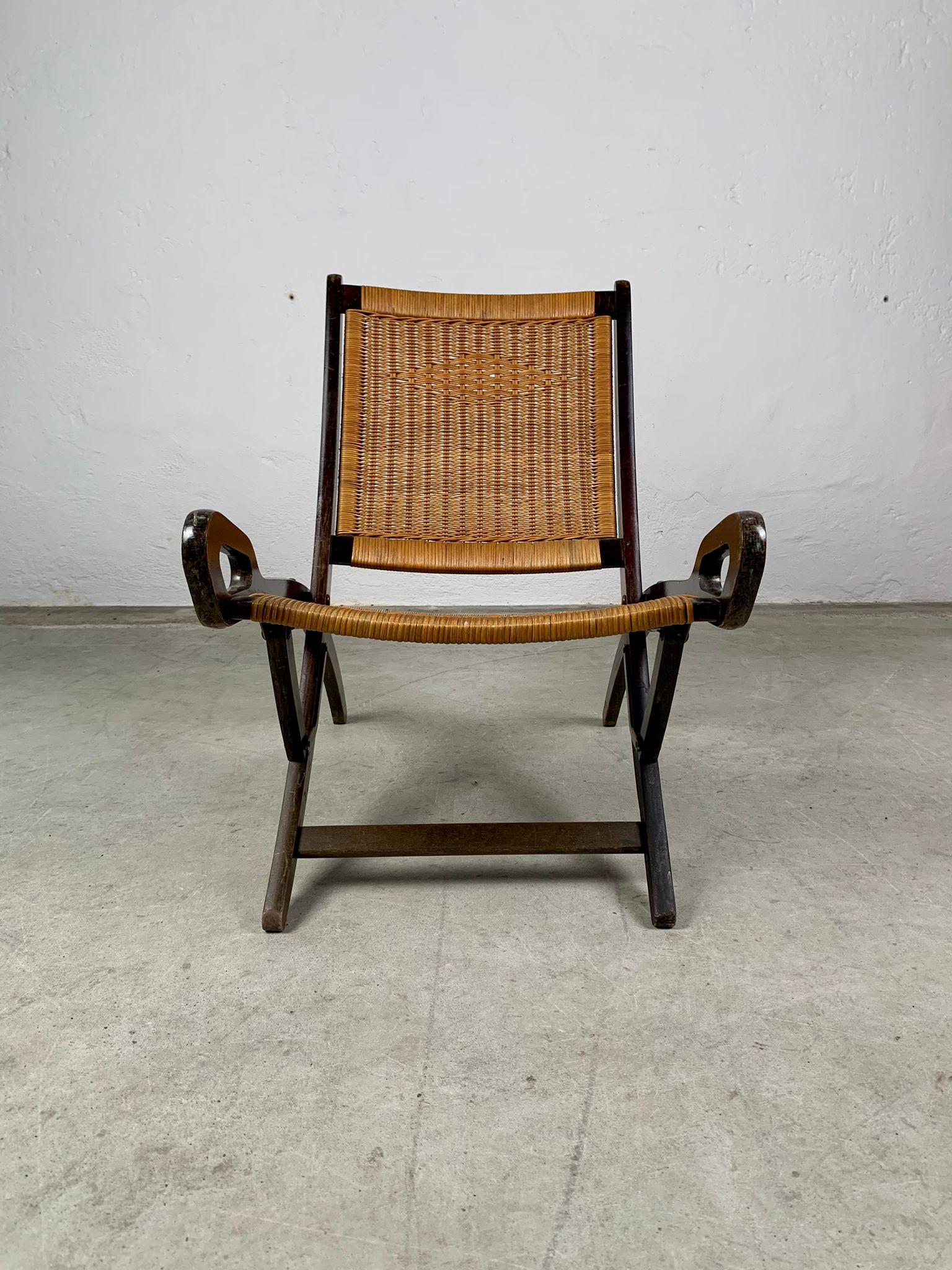 Italian Ninfea armchair with wooden frame and woven straw by Gio Ponti for Reguitti.