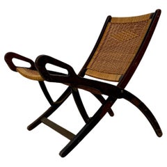 Vintage Ninfea armchair with wooden frame and woven straw by Gio Ponti for Reguitti.