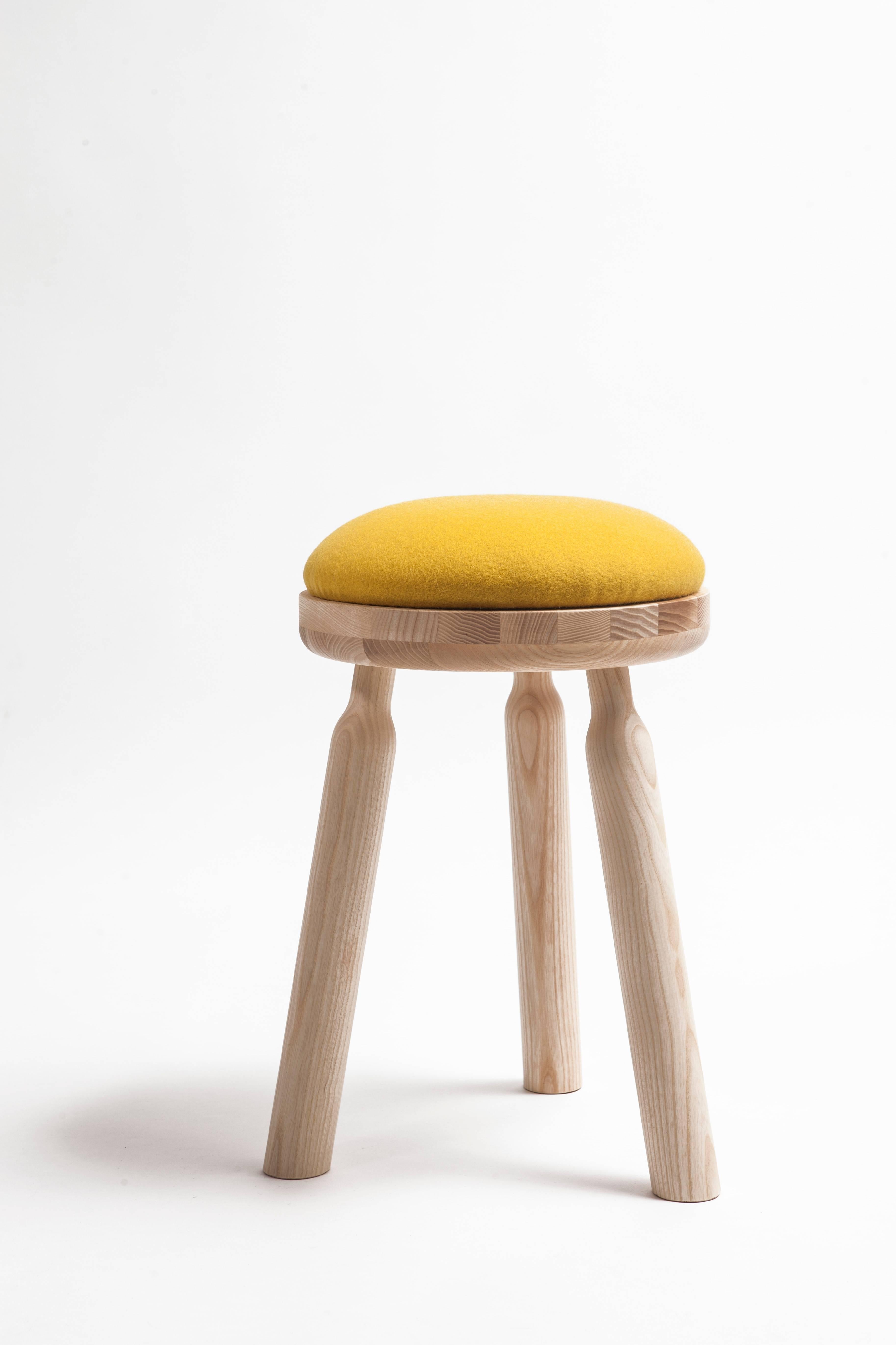 The Ninna stool structure is entirely crafted from hand-turned ashwood materials. The assembly points are tapered to form a sleek bottleneck shape similar to the design of the Ninna armchair.
Small, robust and colored, the Ninna stool is perfect