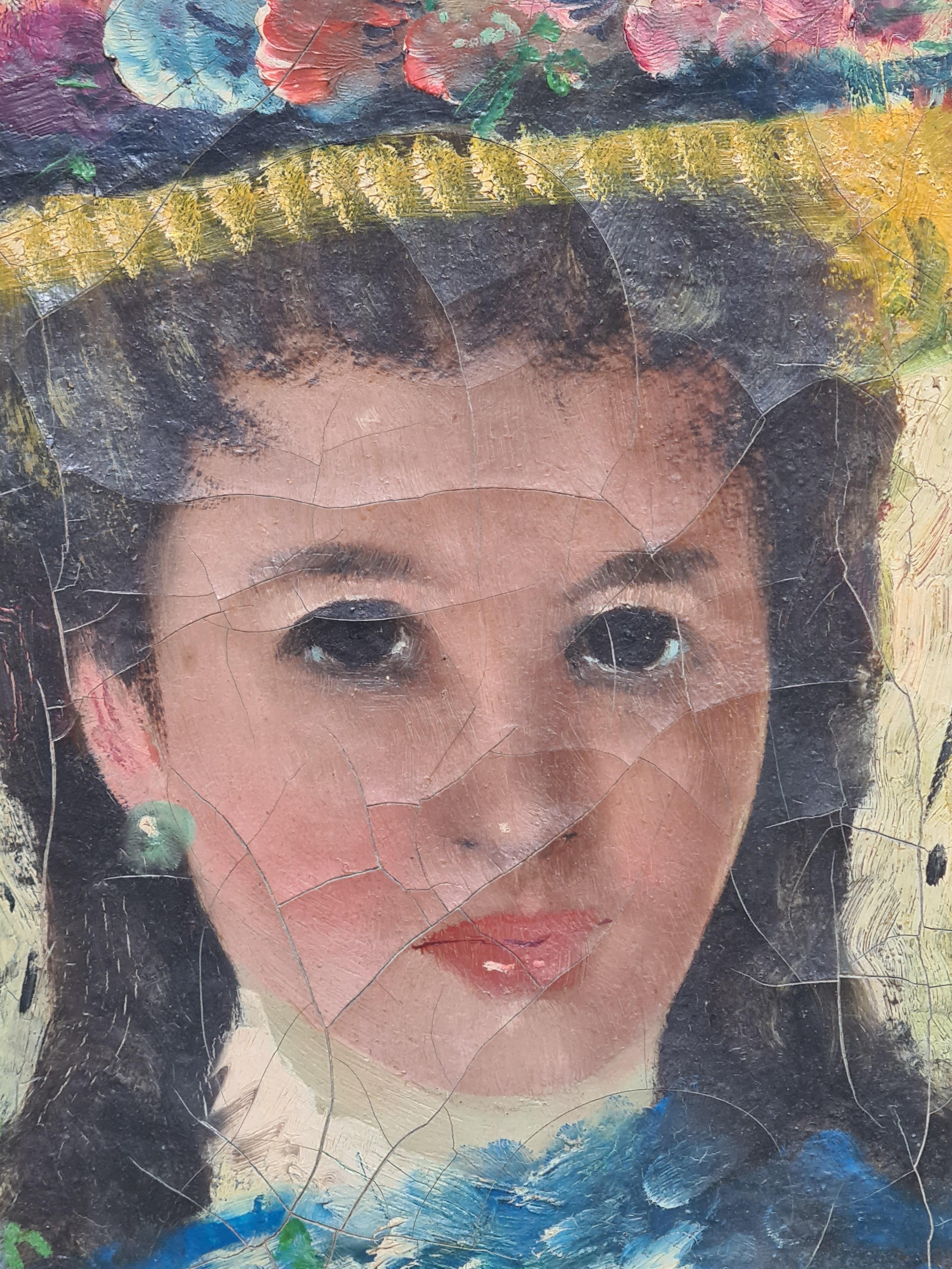 Mid century oil on canvas portrait of a young woman in a hat by Nino Giuffrida. The painting is signed centre right and is presented in a patinated wood frame.

This vibrant painting captures a young woman adorned in a striking hat with a wide brim