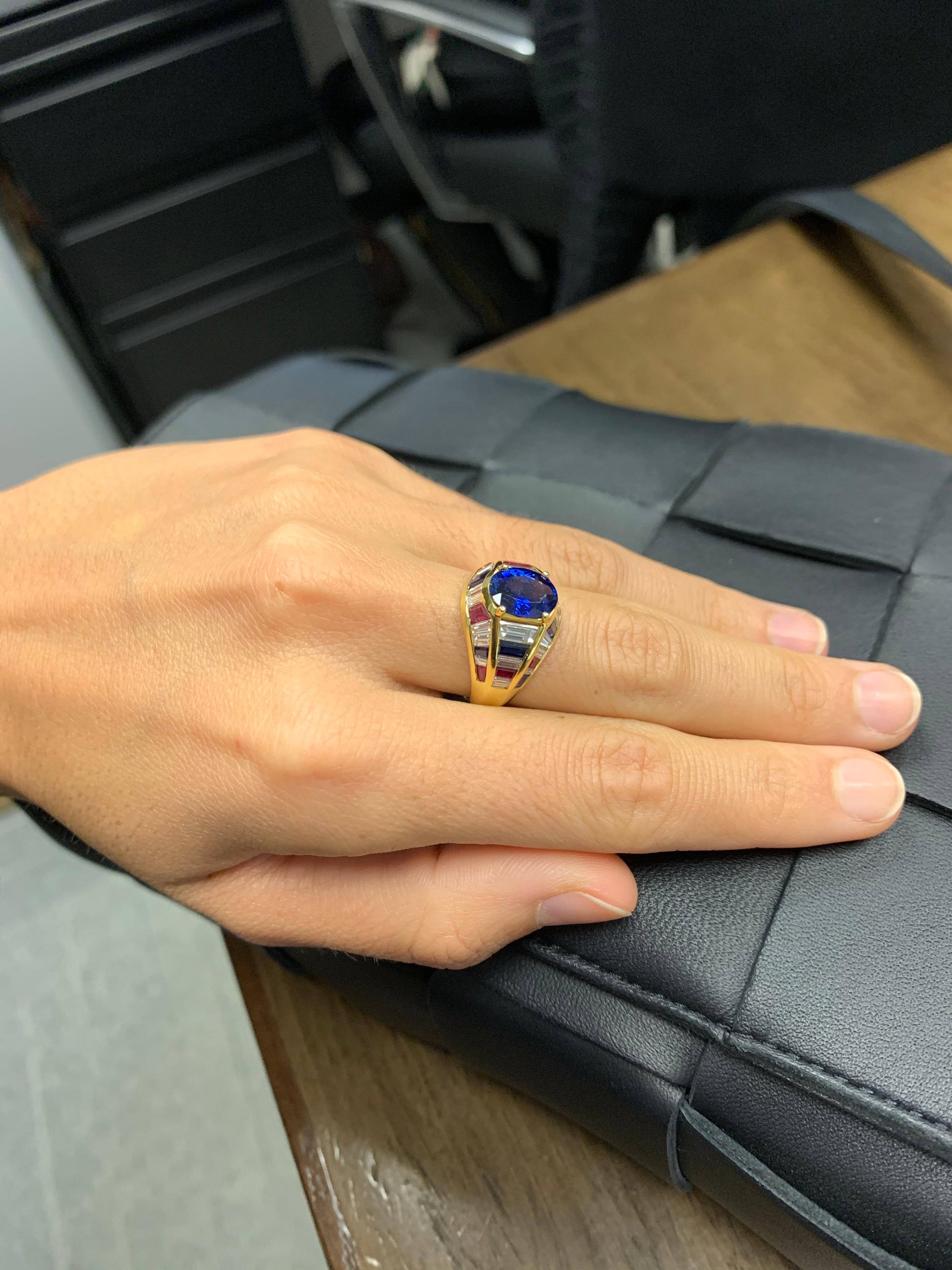 Oval Cut Nino Verita 18 Karat Yellow Gold Ring with Diamonds, Rubies and Sapphires For Sale