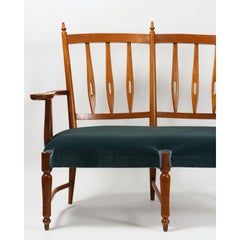 Canapé en bois de cerisier et velours bleu rembourré attribué à Nino Zoncada