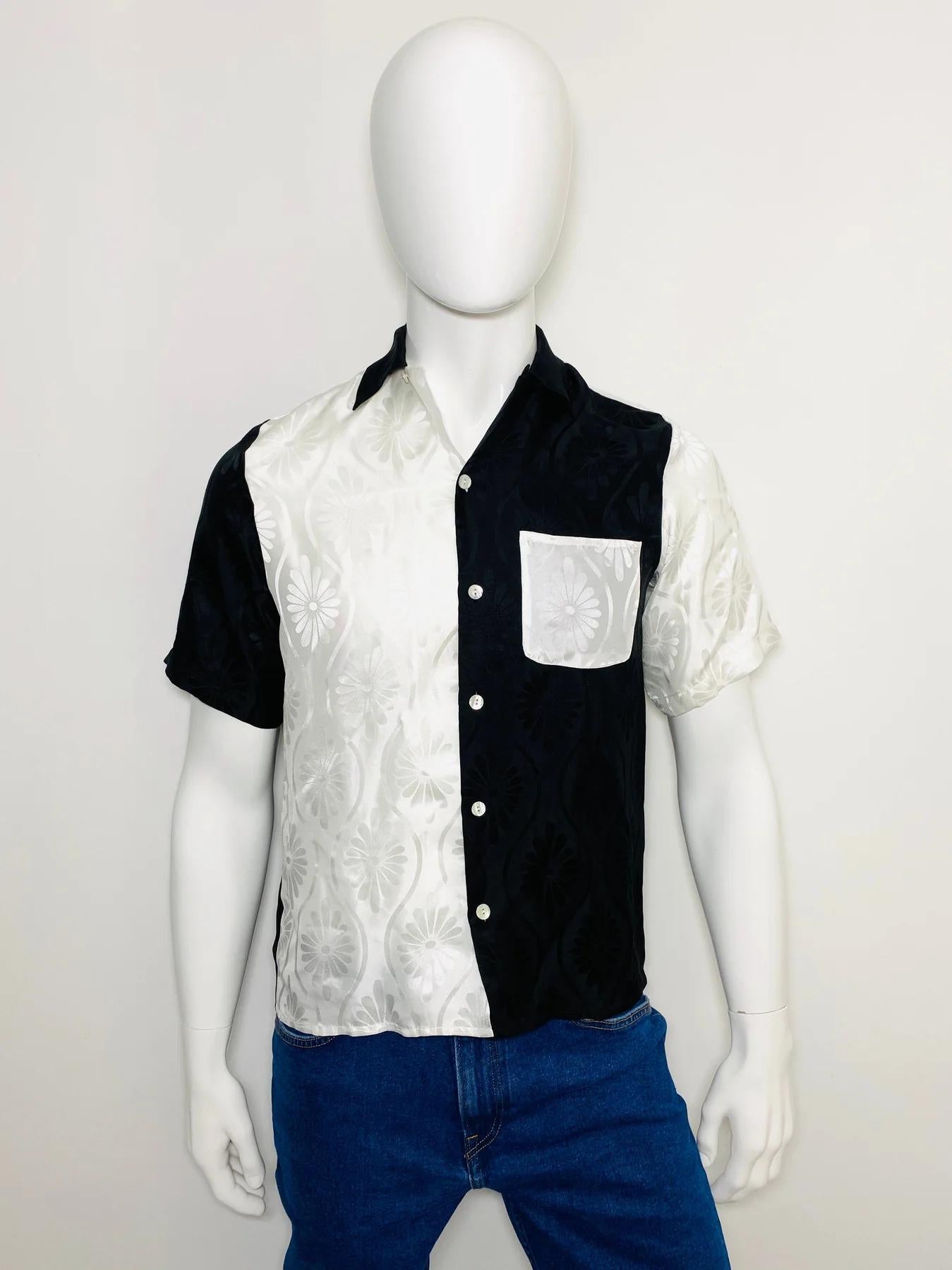 Nipoaloha Aloha Silk Jacquard Shirt

Black and white flower pattern throughout. Buttons fastening to the front.

Additional information:
Size – S
Composition - Silk
Condition – Very Good